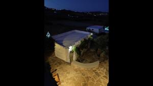 an aerial view of a tent with a skateboard at Artemis Studio Pyrgi in Platis Yialos Mykonos