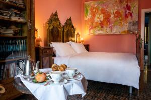 Posteľ alebo postele v izbe v ubytovaní Palazzo Previtera Hotel & Restaurant
