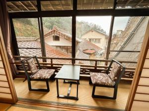 Balkón nebo terasa v ubytování Sangai Ryokan