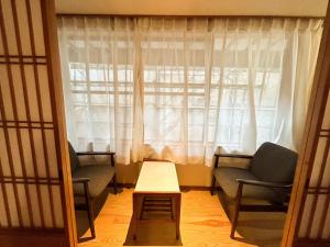Posezení v ubytování Sangai Ryokan
