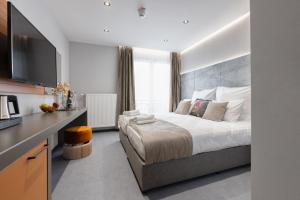Postel nebo postele na pokoji v ubytování Victoria Interpark Hotel