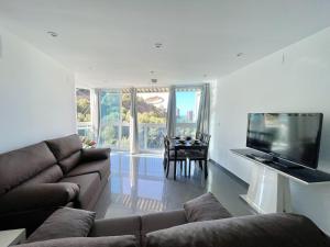 TV a/nebo společenská místnost v ubytování Antena Luxury City