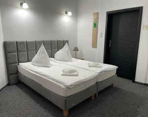 Posteľ alebo postele v izbe v ubytovaní Villa Stary Kalisz