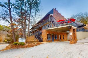 a brick house with a balcony on top of it at Bella Paradiso 14 in Eureka Springs