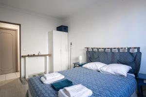 Postel nebo postele na pokoji v ubytování il porto