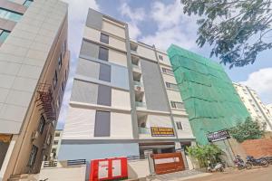 a rendering of a building in a city at The Balcony Hotel in Hyderabad