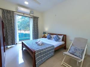 Katil atau katil-katil dalam bilik di Lush Green 3BR Wifi 15 min drive to Panjim Casinos