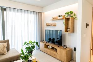 TV a/nebo společenská místnost v ubytování Lilium Apartment
