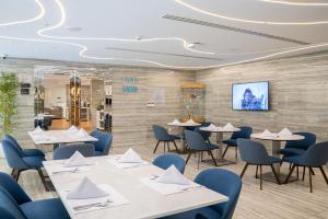 Jouri a Murwab hotel Doha餐厅或其他用餐的地方