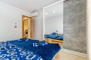 Łóżko lub łóżka w pokoju w obiekcie Apartament Claro