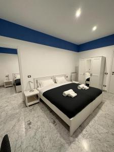 Rúm í herbergi á B&B Una notte a Mazzini