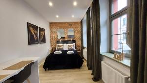Zdjęcie z galerii obiektu Apartamenty KB Toruń w Toruniu
