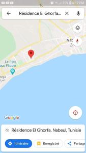 ein Screenshot eines Mobiltelefons mit einer Karte in der Unterkunft Yasmine appartement A7 in Nabeul + 2 Fotos
