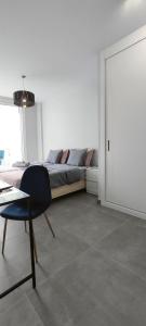 Posezení v ubytování Apartment Las Terrazas Costa Adeje Ocean View + 37 fotografií