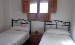 Postel nebo postele na pokoji v ubytování Finca el Berezal