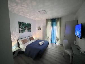 Postel nebo postele na pokoji v ubytování verona rooms 109