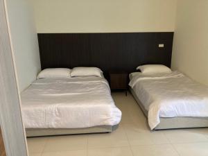 Кровать или кровати в номере Hermes B&B