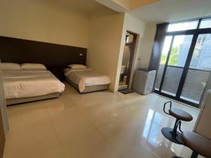 Кровать или кровати в номере Hermes B&B