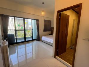 Кровать или кровати в номере Hermes B&B