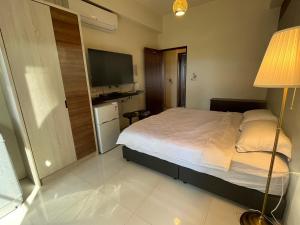 Кровать или кровати в номере Hermes B&B