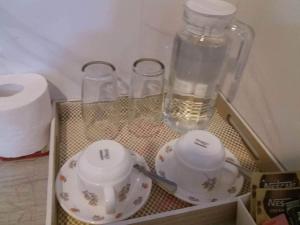 Příslušenství pro přípravu čaje a kávy v ubytování Point Gate Inn