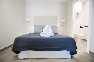 Posteľ alebo postele v izbe v ubytovaní Letmalaga Granada Premium