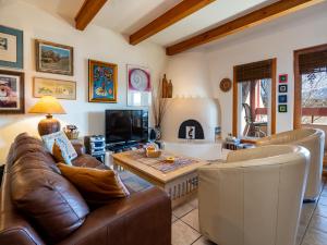 a living room with a couch and a table at Cielo Grande 303, 2 Bedrooms, HDTV, Pet Friendly, Sleeps 6 in Santa Fe