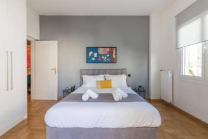 Posteľ alebo postele v izbe v ubytovaní The HostMaster Artistic Inn
