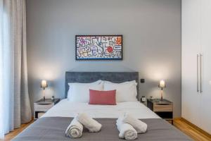Posteľ alebo postele v izbe v ubytovaní The HostMaster Artistic Inn