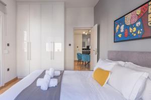 Posteľ alebo postele v izbe v ubytovaní The HostMaster Artistic Inn