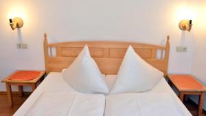 Postel nebo postele na pokoji v ubytování Appartements Kirchmair