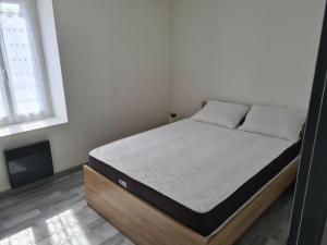 Katil atau katil-katil dalam bilik di Appartement centre ville proche citadelle