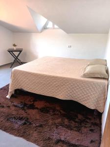 Кровать или кровати в номере Casa da Lu