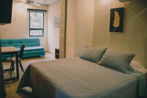 Katil atau katil-katil dalam bilik di Bunde Haus Hotel EXPRESS BOUTIQUE
