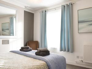 スカーバラにあるWellington Placeのベッドルーム1室(枕2つ付)