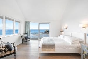 Ένα ή περισσότερα κρεβάτια σε δωμάτιο στο Shore Edge