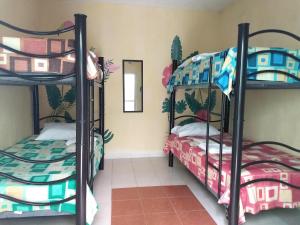 Giường trong phòng chung tại Hostel Áabilo'ob