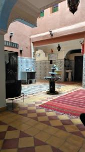 a large room with a table in a building at kasbah Riad dar Ahlam in Aït Baha
