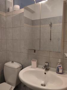 Kúpeľňa v ubytovaní Secret Garden 76 sq.m. apartment close to city center