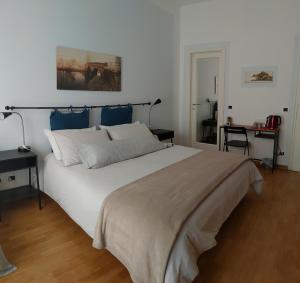 Postel nebo postele na pokoji v ubytování VentoVerde B&B