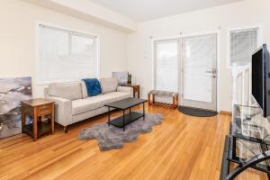 a living room with a couch and a table at Harmony Hills #227 in Anchorage