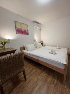 Postel nebo postele na pokoji v ubytování Villa Klara + 37 fotografií