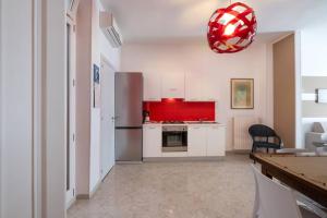 Кухня или мини-кухня в Maree apartments
