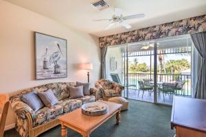 a living room with a couch and a table at Beautiful Naples Golf Villa in Famous Lely Resort! in Naples