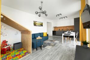 Kuchyňa alebo kuchynka v ubytovaní Apartament Rodzinny - Lamelowy Domek