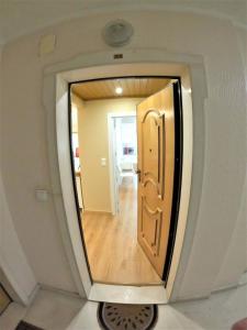 a small hallway with a door in a room at Carnaxide modern T1 apartment w balcony in Carnaxide Oeiras Lisbon in Carnaxide