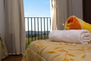 A bed or beds in a room at Mirador del Sotillo