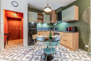 Kuchyňa alebo kuchynka v ubytovaní Appartement Dalmata - Welkeys