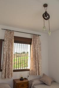 A bed or beds in a room at Mirador del Sotillo