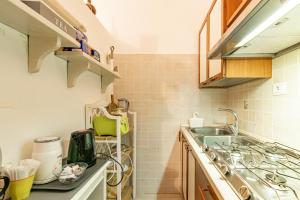 A kitchen or kitchenette at Casa Lilliosa